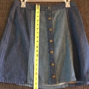 Navy blue, knee length. Denim skirt